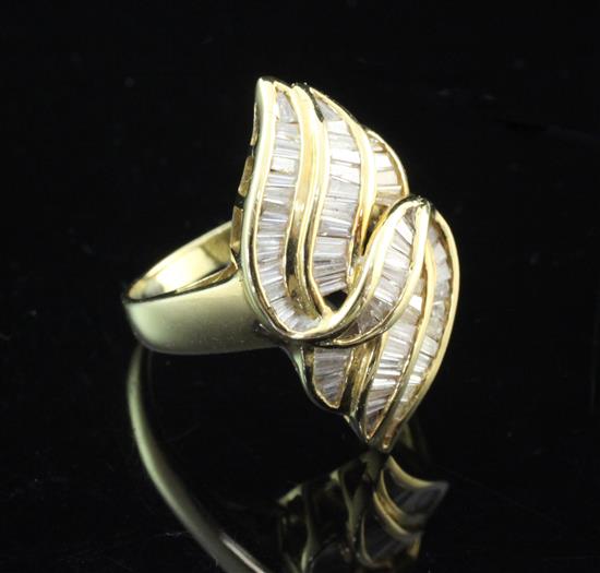 An 18ct gold and diamond dress ring, size L.